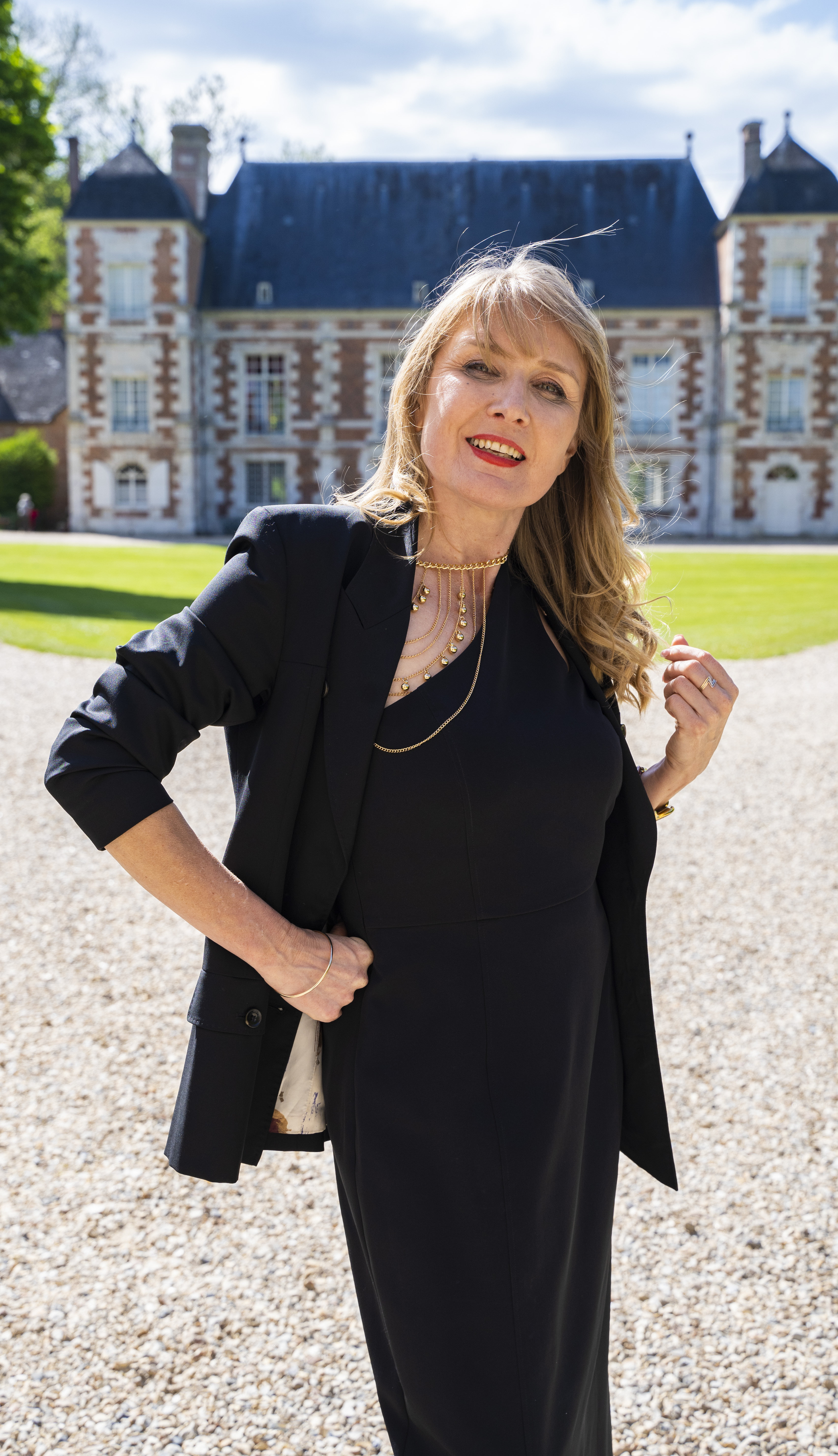 Tatiana Chance, founder of Agence Chance, in front of Château de Bonnemare
